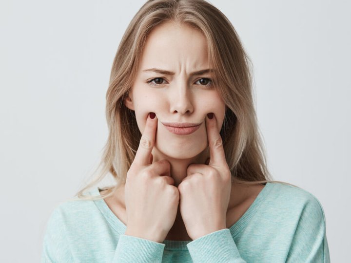 Як зняти запалення ясен дома?