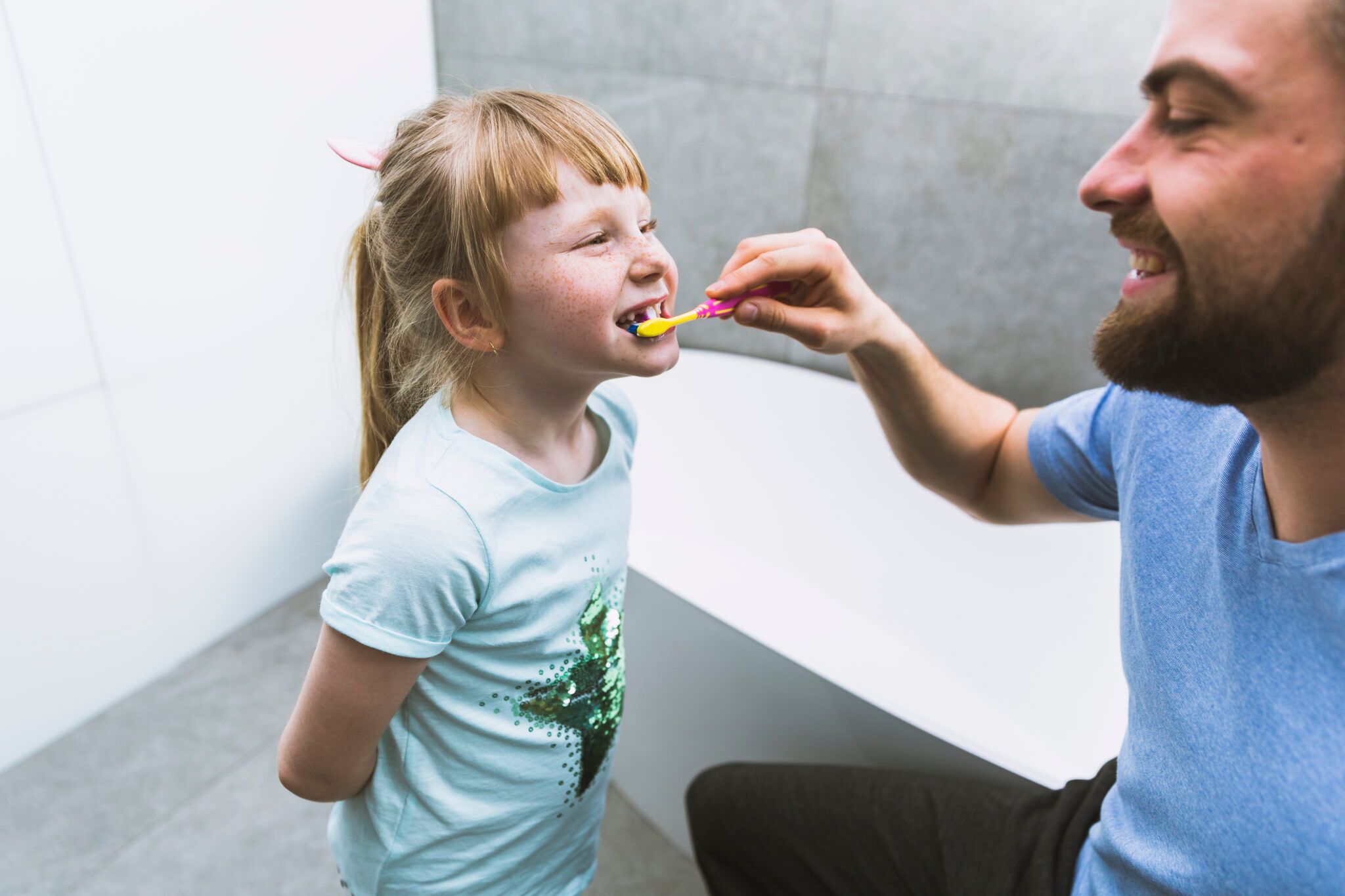 Man Brushing Teeth Daughter 2048x1365