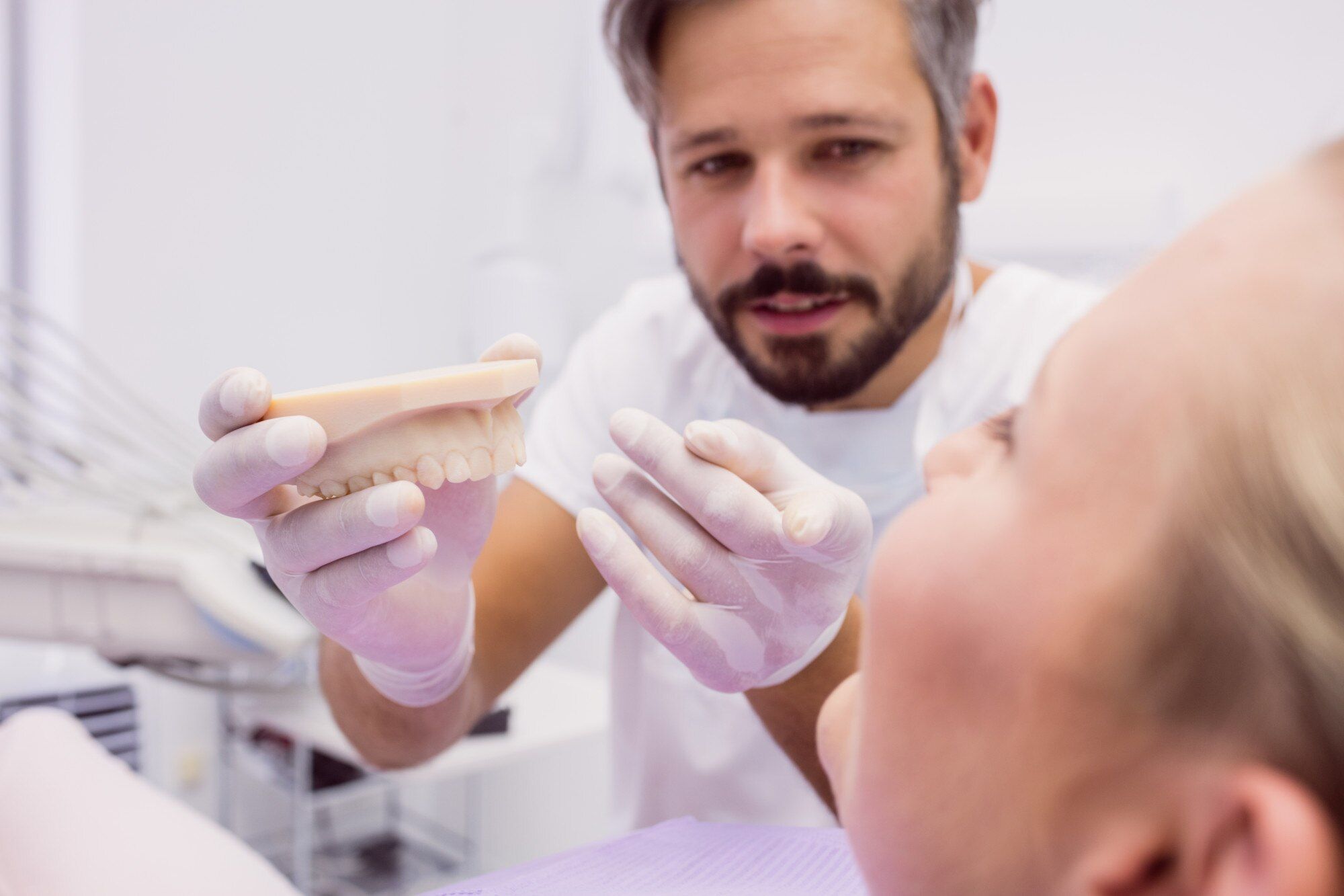 Dentist Showing Denture Model Patient 107420 65328